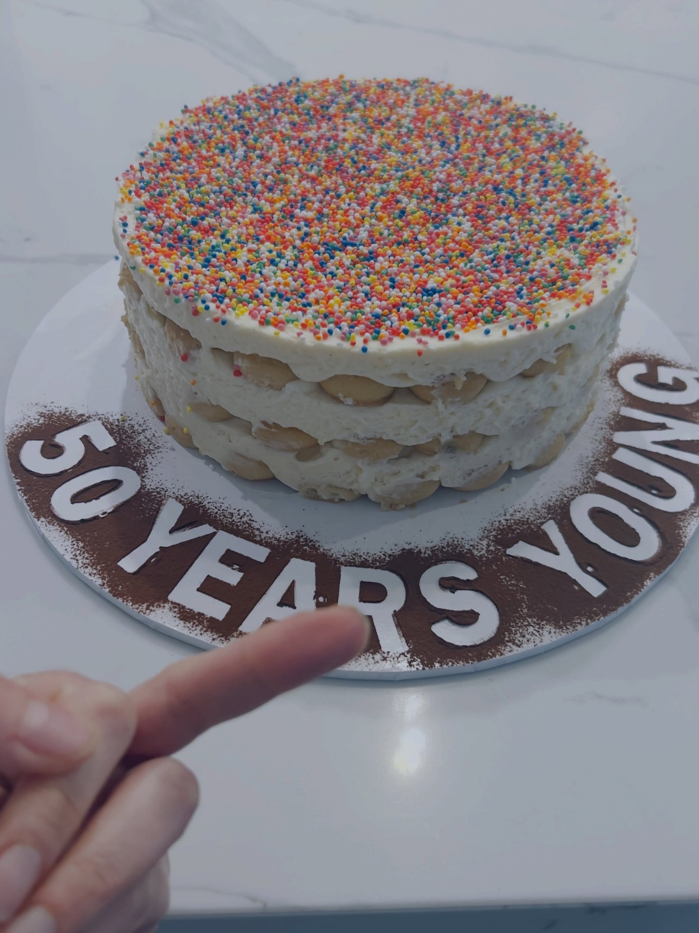 Happy Birthday tiramisu cake with sprinkles