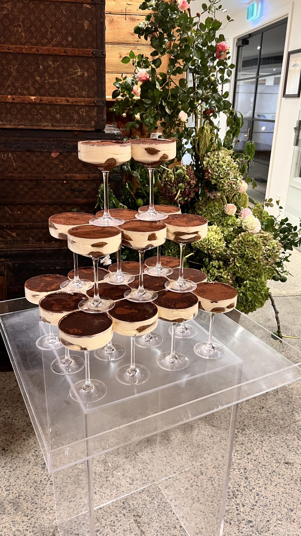 Individual tiramisu dessert cups plated for a corporate event
